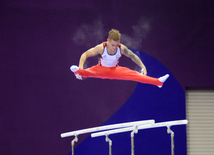 Azərbaycan gimnastı Oleq Stepko Avropa Oyunlarında paralel qollarda hərəkətlərdə qızıl medal qazandı. Bakı, Azərbaycan, 20 iyun 2015